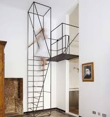 Curved staircase design that doesn't occupy much floor space but looks trully amazing. Steps To Saving Space 15 Compact Stair Designs For Lofts Urbanist