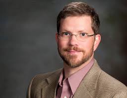 Philip Olson Receives Excellence in Outreach and International Initiatives  Award