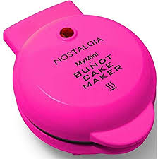 Before the cake is completely cool, carefully run a knife between the cake and the pan. Amazon Com Nostalgia My Mini Lava Bundt Cake Maker Compact Size For Dorm Rooms Or Small Kitchens Make Mini Muffins Pink Home Kitchen