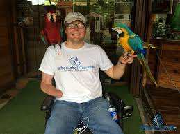 Kl tower mini zoo на карте. Photo Description John Holding Two Birds At The Kl Tower Mini Zoo In Kuala Lumpur Wheelchair Travel