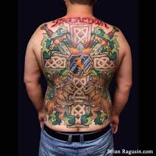 Prince harry's 'per mare per terram' marines tribute to prince philip: Celtic Cross Family Crest Tattoo With Lions And Swords Family Crest Tattoo Crest Tattoo Dragon Sleeve Tattoos