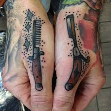 Or, that the wearer used to behave in a way that was cutting his own throat. Jack S Straight Razor And Jacknife Comb Tattoo On Both Hands