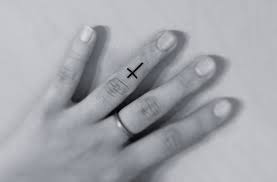 The shadings for these fingers crossed tattoo also follows a vintage style, and there is a small red flower accompanying this tattoo design. Cross Tattoo On Finger Designs Ideas And Meaning Tattoos For You