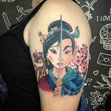 #disney #disneytattoo #disneyink #mulan #mulantattoo #tattoo #tattoos #tattooed a bit swollen and bloody but here's leanne's mulan done yesterday @broadsideswansea. Mulan Tattoo Feita Por Keka Miranda Disney Tattoos Tattoos Cool Tattoos