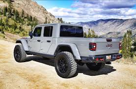Sting Gray Lifted 2020 Jeep Gladiator On 37 S Jeep Gladiator Jeep Pickup Jeep Scout