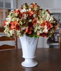 It was officially named in 1915, but its true shade is still burnt orange has both negative and positive connotations. Artificial Flowers Fake Hydrangea Flowers Burnt Orange Etsy Fake Hydrangeas Hydrangea Flower Artificial Flowers