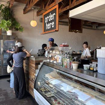 Pastry case and coffee bar at Ollie Vaughn's in Phoenix