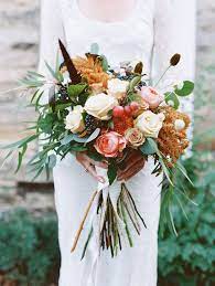 This is an early winter bouquet with snowberries, antique cabbage roses and the first dutch tulips of the season. 52 Gorgeous Fall Wedding Bouquets Martha Stewart