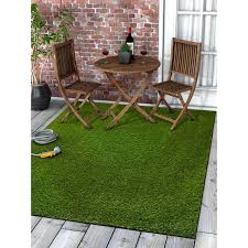 This adhesive is ideal for interior patios or sunrooms as well as basements or the surfaces surrounding swimming pools, jacuzzis and spas. Well Woven Arcadia 6 Ft 7 In X 9 Ft 3 In Turf Green Artificial Grass Rug Ar 6 The Home Depot Grass Carpet Outdoor Carpet Indoor Outdoor Carpet