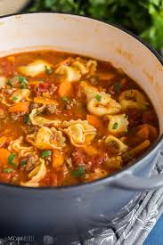 This Sausage Tortellini Soup Is A Tomato Based Soup Loaded With Vegetables Italian Sausage And Tortellini Soup Recipe Sausage Soup Recipes Tortellini Recipes