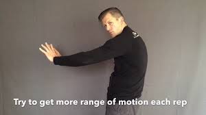 The cat and cow stretch is an oldie but goodie that doubles as a great warmup for your spine before just about any activity. 2 Minute Drill Standing Cat Cow Youtube