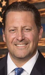 Former Douglas County sheriff calls for candidate of opposing party to drop  out