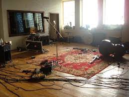 Photo studio with hardwood floors, vibrant colorful walls and big north facing window. Best Flooring For Recording Studios Range Of Sounds