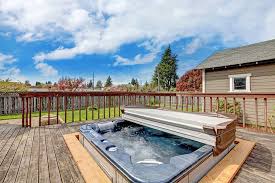 This version is built into a raised stone garden bed and is covered by a curved pergola structure. What Sort Of Base Do I Need For A Hot Tub Hot Tub Focus