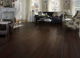 Get The Look Of Wood Floors For Much Less 7 Laminate Picks Brown Laminate Flooring Dark Laminate Floors Floor Colors