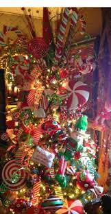 I'm doing the candy theme this. Follow The Link For More Information Metal Tabletop Tree Follow The Link For More Info Viewi Elf Christmas Tree Candy Christmas Tree Christmas Tree Themes