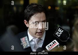 Samuel Johnson emerges from Sydney's Downing Centre Courthouse with his  girlfriend Sarah Hallam. Johnson, the former '
