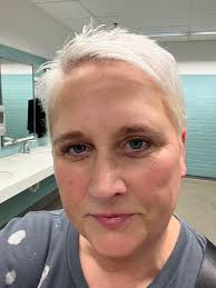 Cat with dangling arms