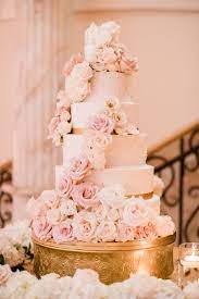 Wedding cake with blush pink flowers. Cindy Fabian Pink Wedding Cake Light Pink Wedding Wedding Cake Roses