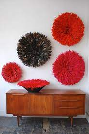 Red Juju Hat Wall Hanging Etsy In 2021 Juju Hat Wreath Crafts Feather Decor