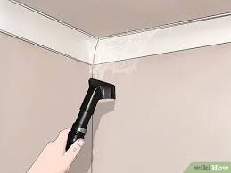 Dislodged spider mites appear as tiny spots moving slowly about on the white surface. 3 Ways To Get Rid Of Spider Webs Wikihow