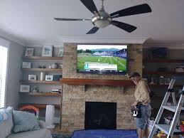 Does a blower fan make the fireplace much more efficient in terms of using the btu's. Mounting Tv Over A Gas Fireplace South Charlotte Tv Mounting Handyman Service