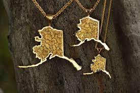 Collection Of Our Alaska State Map Pendants Done In 14kt Yellow Gold With Natural Alaskan Gold Nuggets F Gold Nugget Jewelry Natural Gold Nugget Gold Nugget