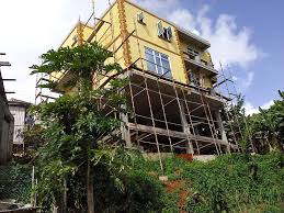 He is a residential real estate expert who can help you make a move in edmonton. Residential Home Construction In Grenada Home Construction Tropical Houses House Design