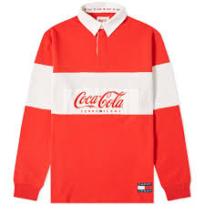 Available in a range of colours and styles for men, women, and everyone. Tommy Jeans X Coca Cola Rugby Shirt Coca Cola Tommy Jeans
