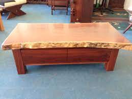 It has a continuous frame with the actual top suspended in between the two horizontal rails. Coffee And Hall Tables Lifestyle Jarrah