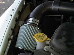Used some clamp together pieces for the tube, a universal oilless cone filter, and welded up my own box with a tube taking air from the factory spot in the fender. Another Diy Cold Air Intake Dodgeforum Com
