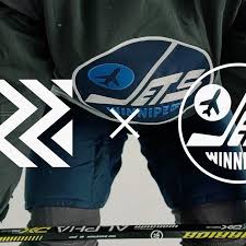 Remastered in fighter grey this jersey takes the classic. Winnipeg Jets The Reverse Retro Jersey Combines The Classic Style With The Team S Current Colo Winnipeg Jets Team S Winnipeg