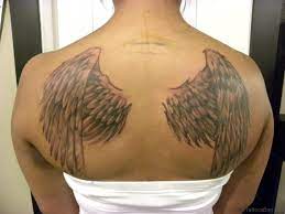 Skull back tattoo design with wings @gergelyszilagyi84. 84 Amazing Angel Wings Shoulder Tattoos