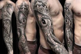 Best octopus tattoos, octopus tattoo designs, octopus tattoo ideas, arm, leg, red, colored, ship, small, thigh, amazing, girls, men, women, back, leg, Realistic Red Octopus Tattoo