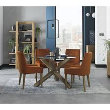 Modern round table with cross legs design. Variety Of Cross Leg Dining Tables At Oak Furniture Uk Oak Furniture Uk