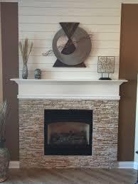 Updated Fireplace With Ledger Rock Floor And Decor Shiplap Wall Home Depot Wall Art C Jere New Brick Fireplace Makeover Ship Lap Walls Fireplace Remodel