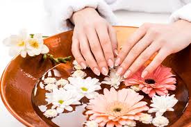 The staffs were super nice and conversational. Cropped View Of Woman Making Spa Procedure With Flowers In Beauty Salon Nail Care Concept Free Stock Photo And Image