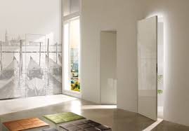 Any of our door designs can be integrated into this system. Door Collection Secret Barausse