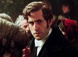 Oliver Jackson-Cohen as William Weightman EMILY (2022)