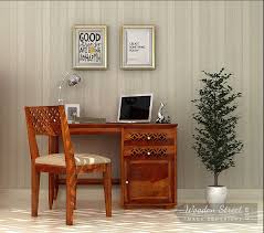 Cambrey Study Table Is Having Enticing Patterns On It A Fascinating Piece To Study And Decorate The Wooden Study Table Study Table Designs Study Room Furniture