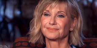 Her mother was german, daughter of the physicist max born. Olivia Newton John Reveals Secret Cancer Diagnosis In New Interview