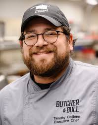 The flavors that make your night unforgettable start with the vision in our  kitchen. Meet Tim, the chef turning every bite into an experience worth  savoring. 👨‍🍳 #ButcherAndBull #WinstonSalemEats #NCFoodie #ForkYeah  #SavorNC #