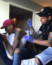 Chris brown neck tattoo for men. Chris Brown Tattoo Inked Magazine Tattoo Ideas Artists And Models