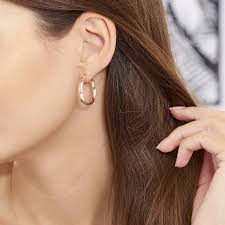 Cette paire de boucles d'oreilles de forme ronde dégage un vrai sentiment de richesse. Boucles D Oreilles Creoles Argent Sans Pierre Rond Rose 925 1000 Faofrw00980 Histoire D Or