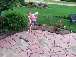 Your patio design will be entirely unique, as no two pieces of flagstone are the same! Filling In The Gaps Part 3 Of Our Diy Flagstone Patio Flagstone Patio Patio Stones Stone Patio Designs