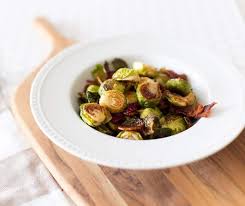 Arrange on 2 baking sheets and toss with the olive oil. Roasted Brussels Sprouts With Bacon And Cranberries