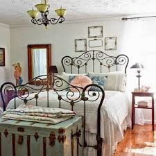 Add just a touch of bright color for the rest of the bedroom decor, such as the oversized pink lamp and striped throw pillows. Tips And Ideas For Decorating A Bedroom In Vintage Style