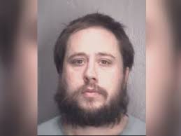 Police: Man beats victim with wooden stick then robs him