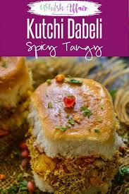 Kutchi Dabeli Is A Popular Indian Street Food And It S Basically Pav Stuffed With A Tangy And Spicy Potato Masal In 2020 Indian Street Food Indian Food Recipes Recipes