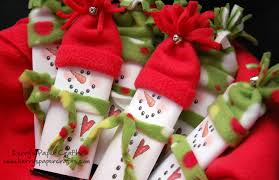 Enjoy these christmas candy recipes to make for gifting, stocking stuffers, serving at festive parties, or enjoying in front of the tree. Hershey Candy Bar Snowman